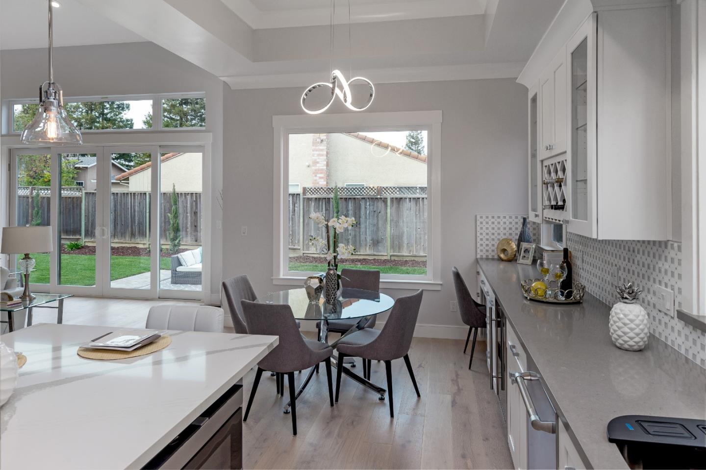 1639 Walters Avenue Campbell, CA 95008 - Photo 16 of 30 a dining room with furniture a chandelier and wooden floor