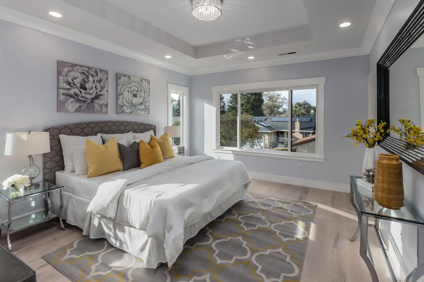 1639 Walters Avenue Campbell, CA 95008 - Photo 22 of 30 a bedroom with a bed painting on wall and a large window