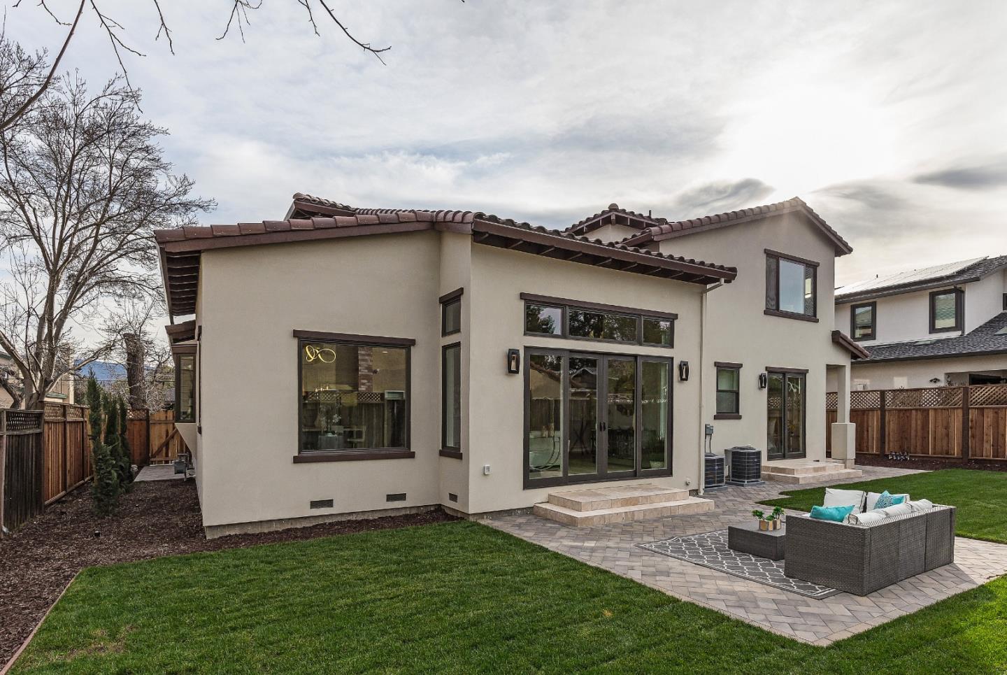 1639 Walters Avenue Campbell, CA 95008 - Photo 28 of 30 a view of a white house with a big yard and potted plants
