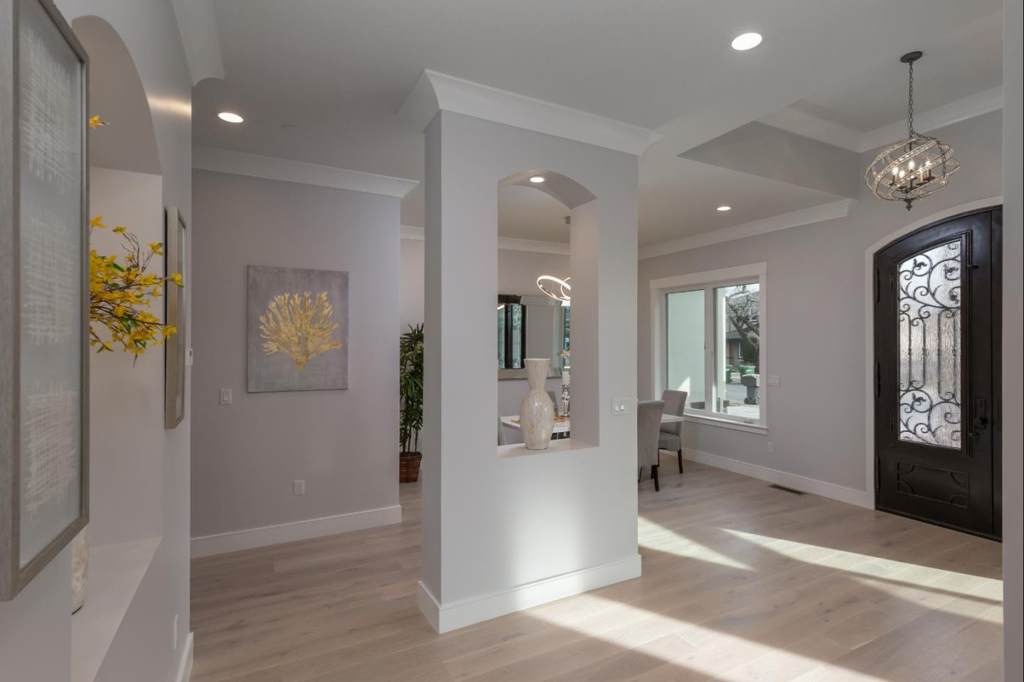 1639 Walters Avenue Campbell, CA 95008 - Photo 4 of 30 a view of a hallway with wooden floor and a living room