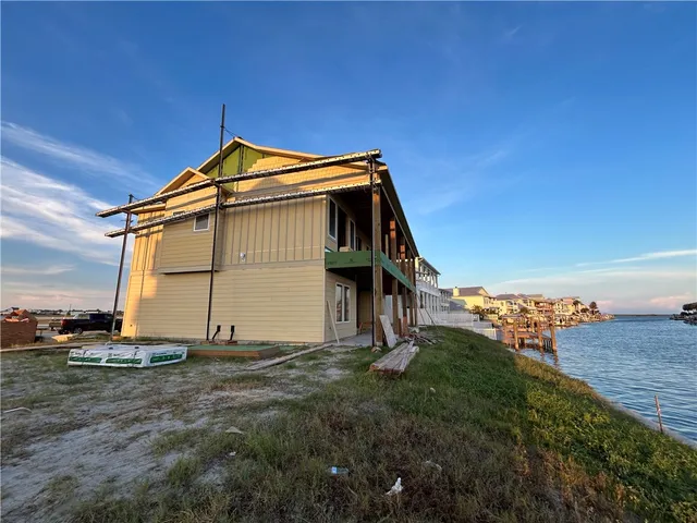 a house view with a garden space
