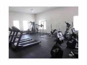 704 Southwest 2nd Way Pompano Beach, FL 33060 - Photo 20 of 22 a picture of a room with gym equipment
