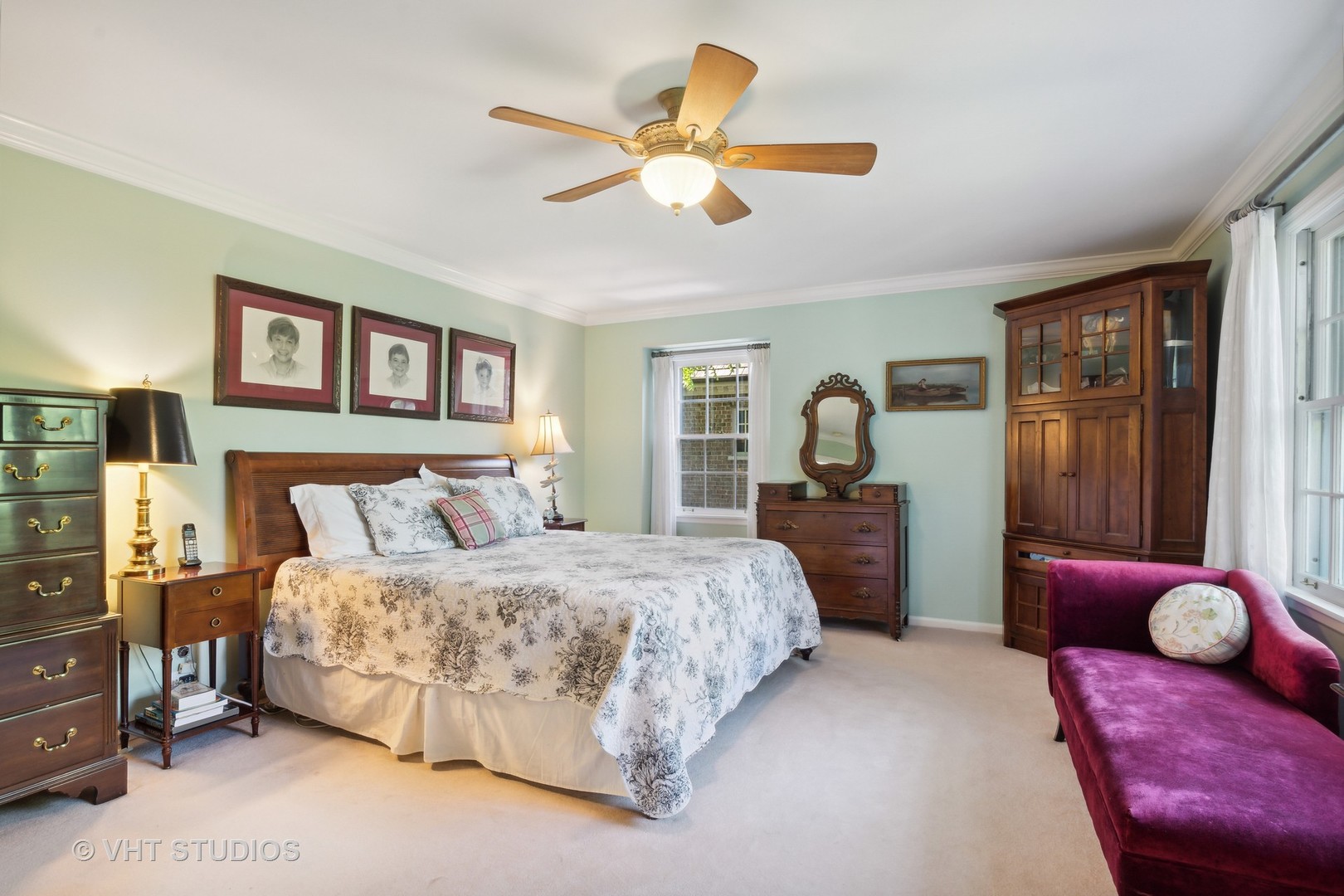 340 Ridge Avenue Winnetka, IL 60093 - Photo 15 of 29 a bedroom with a bed and a chandelier