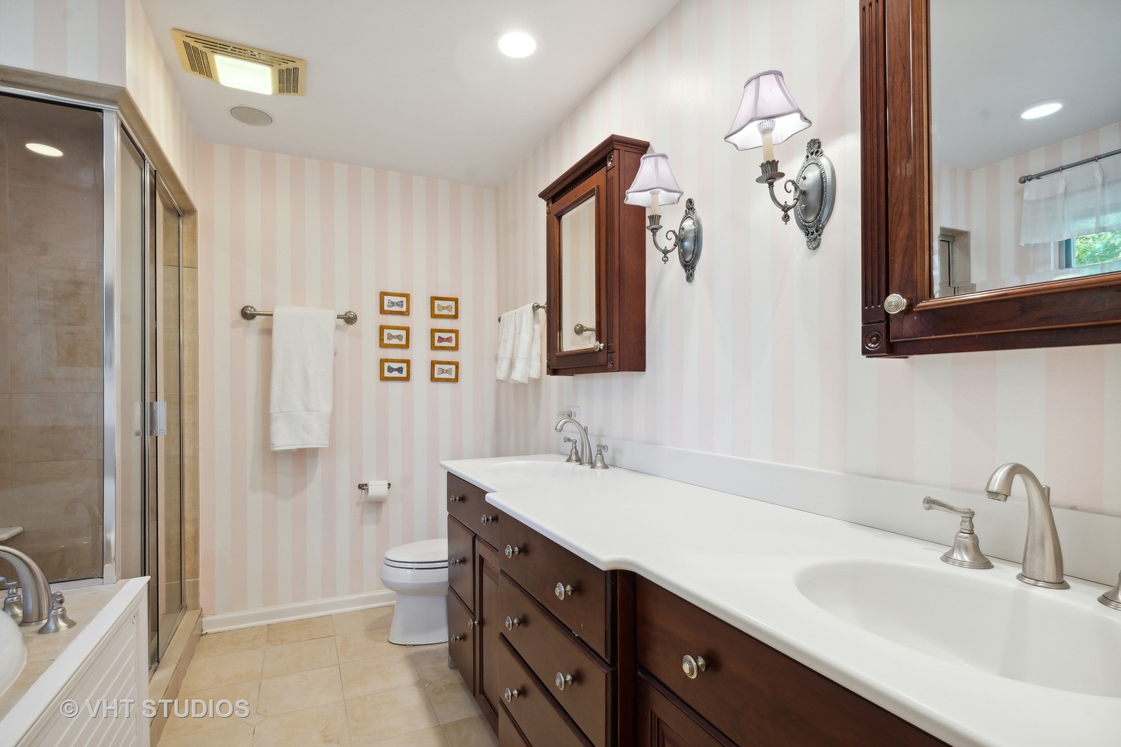 340 Ridge Avenue Winnetka, IL 60093 - Photo 16 of 29 a bathroom with a double vanity sink mirror and toilet
