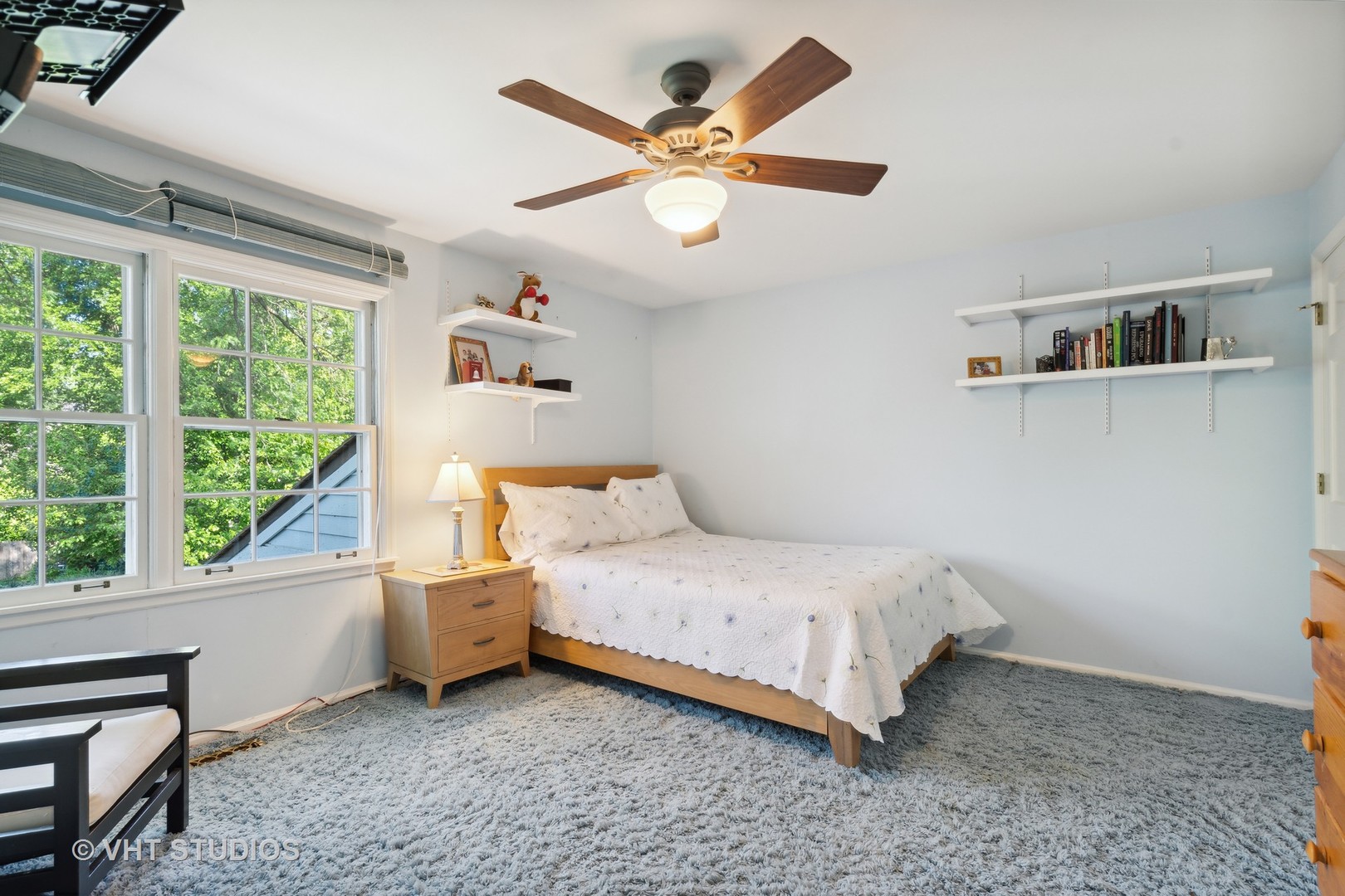 340 Ridge Avenue Winnetka, IL 60093 - Photo 19 of 29 a bedroom with a bed and a large window