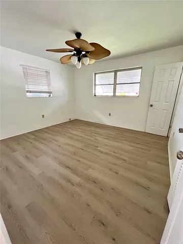 a view of swimming pool with outdoor seating and yard