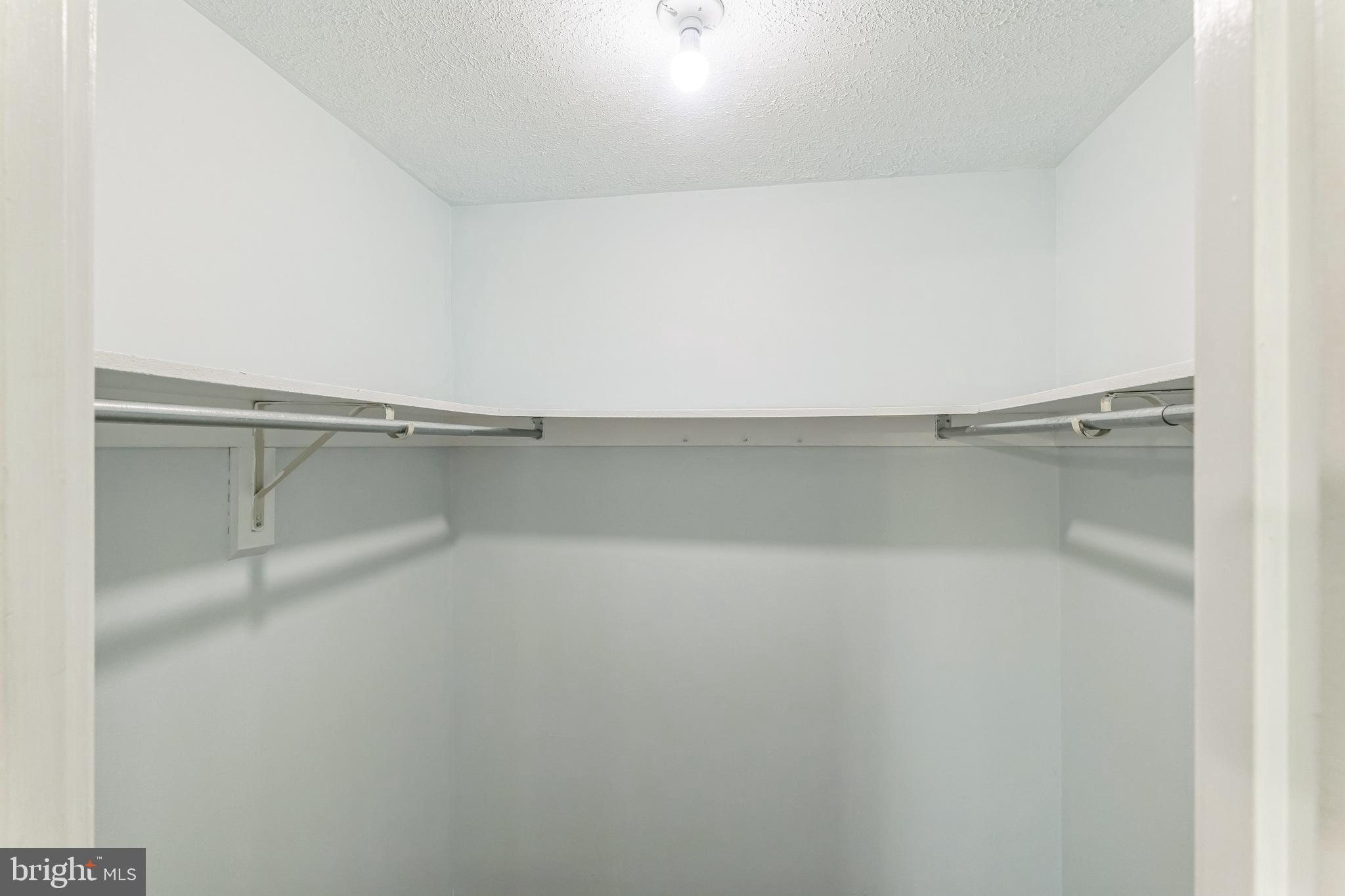 13106 North Point Lane Laurel, MD 20708 - Photo 13 of 30 a view of a room with racks on the wall