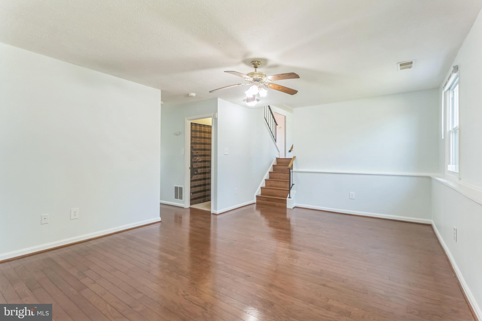 13106 North Point Lane Laurel, MD 20708 - Photo 19 of 30 wooden floor in an empty room with a window