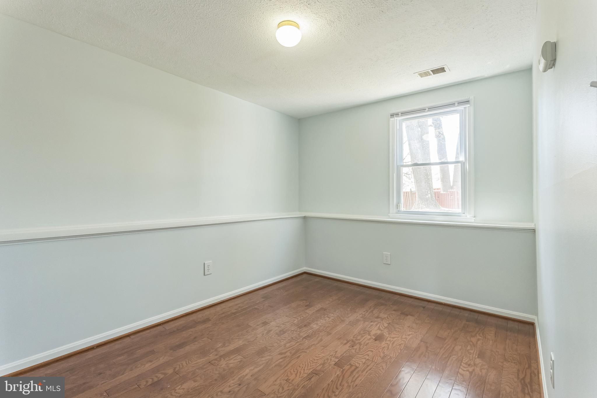 13106 North Point Lane Laurel, MD 20708 - Photo 20 of 30 an empty room with a window