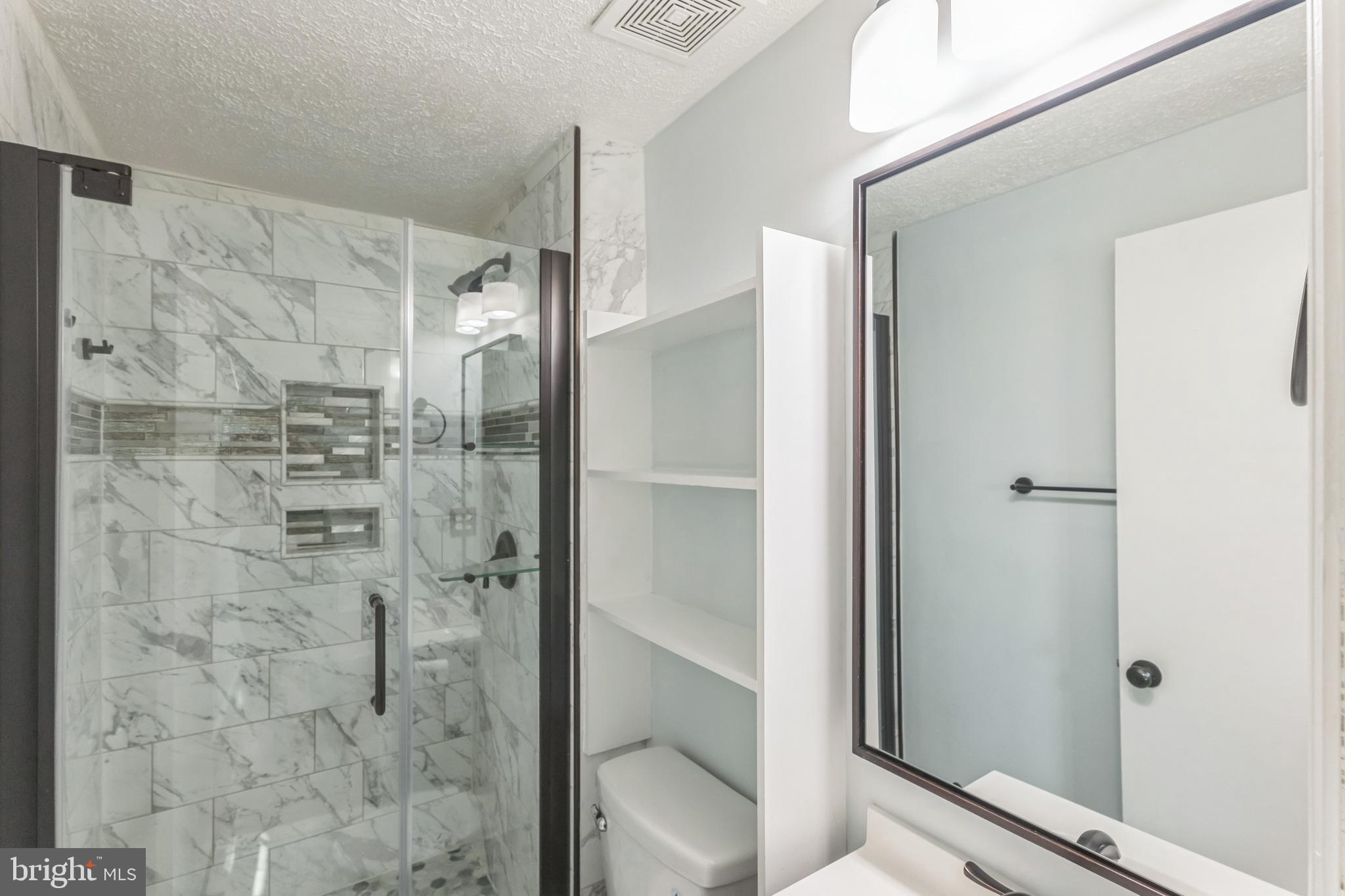 13106 North Point Lane Laurel, MD 20708 - Photo 8 of 30 a bathroom with a shower