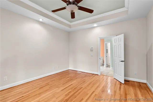 a view of an empty room with glass door