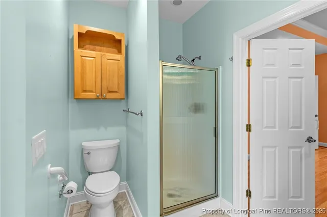 a bathroom with a bathtub and a window