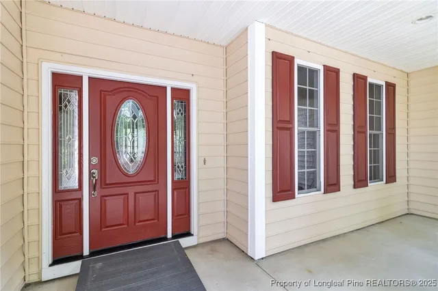 a view of front door with hallway