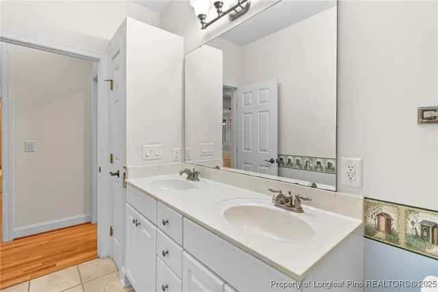 an empty room with a ceiling fan