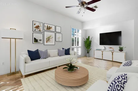 a view of a dining room with furniture and window