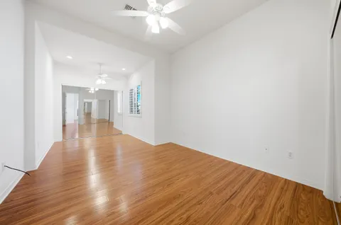 a bathroom with a sink a mirror and a shower