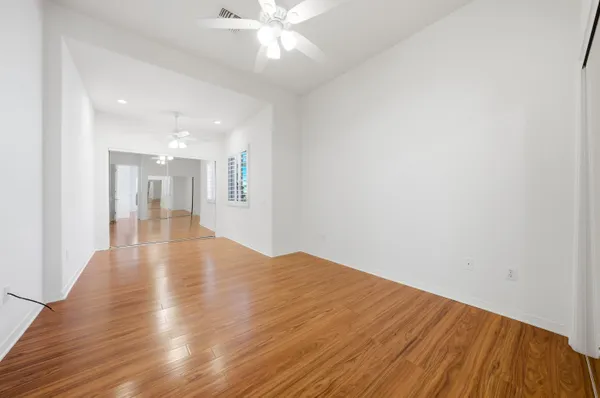 a bathroom with a sink a mirror and a shower