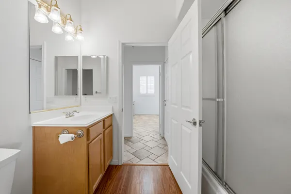 an aerial view of a house with a yard and potted plants
