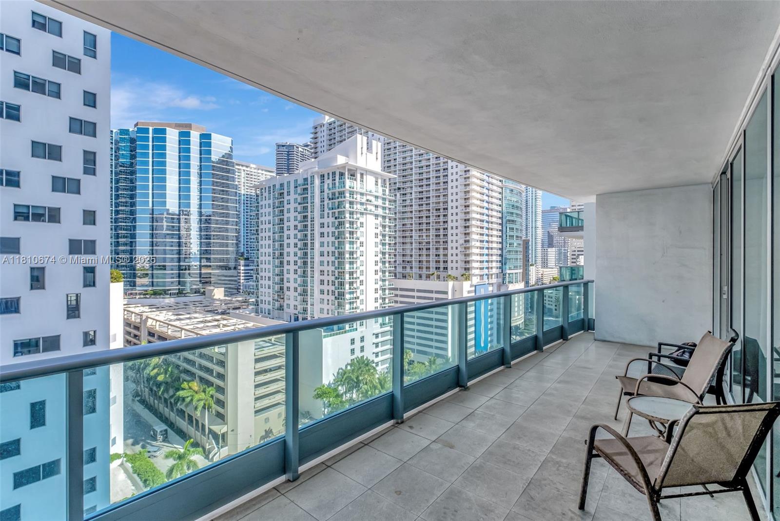 1331 Brickell Bay Drive, Unit 1504 Miami, FL 33131 - Photo 11 of 30 a view of a balcony with furniture