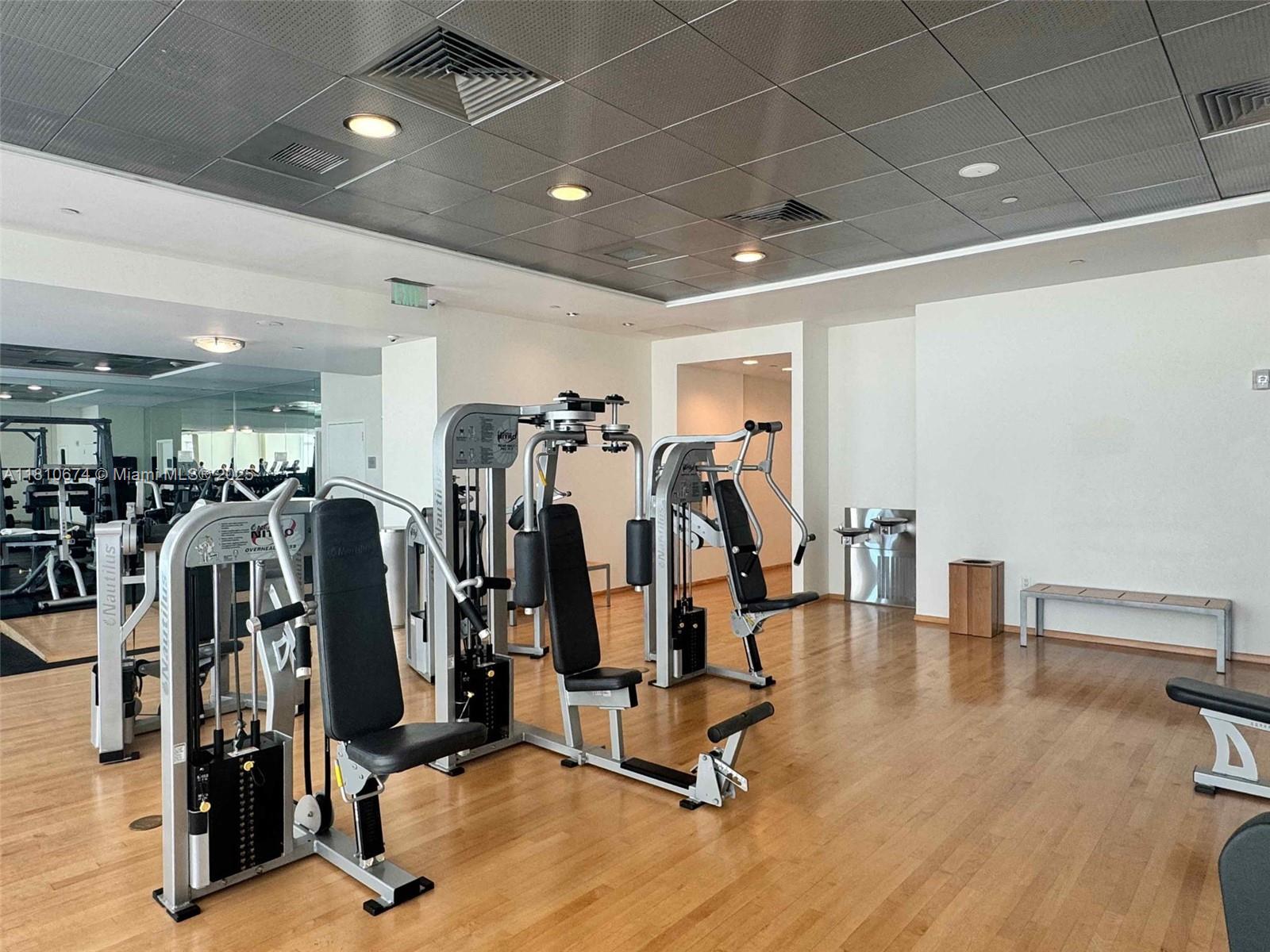 1331 Brickell Bay Drive, Unit 1504 Miami, FL 33131 - Photo 17 of 30 a view of a room with gym equipment