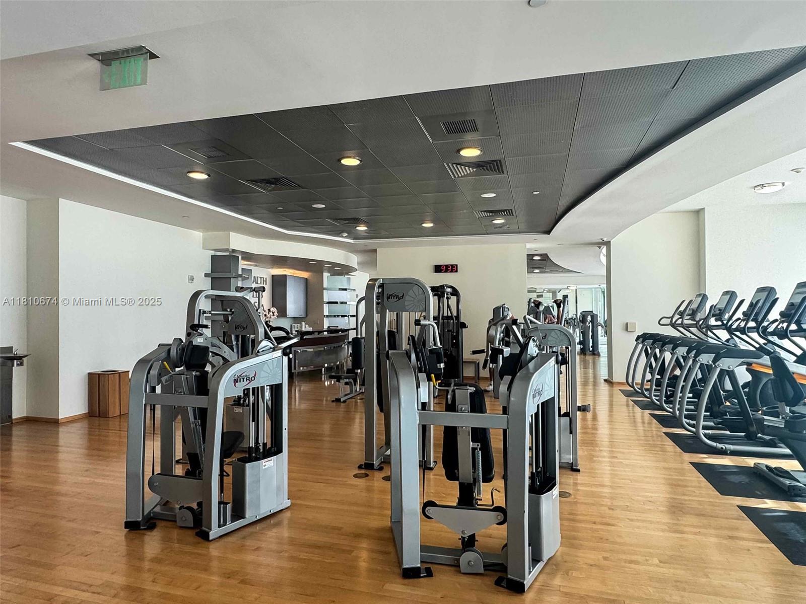 1331 Brickell Bay Drive, Unit 1504 Miami, FL 33131 - Photo 23 of 30 a view of a room with gym equipment