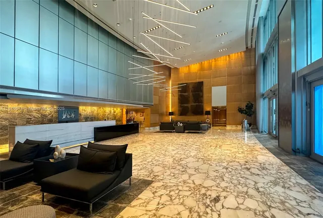 a living room with patio furniture