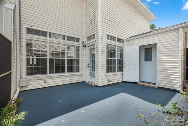 a view of front door with outdoor space