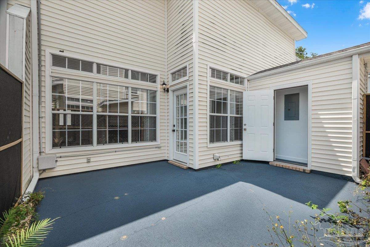 601 East Burgess Road, Unit J2 Pensacola, FL 32504 - Photo 36 of 38 a view of front door with outdoor space