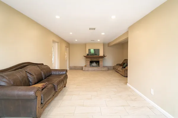 a living room with furniture and a couch