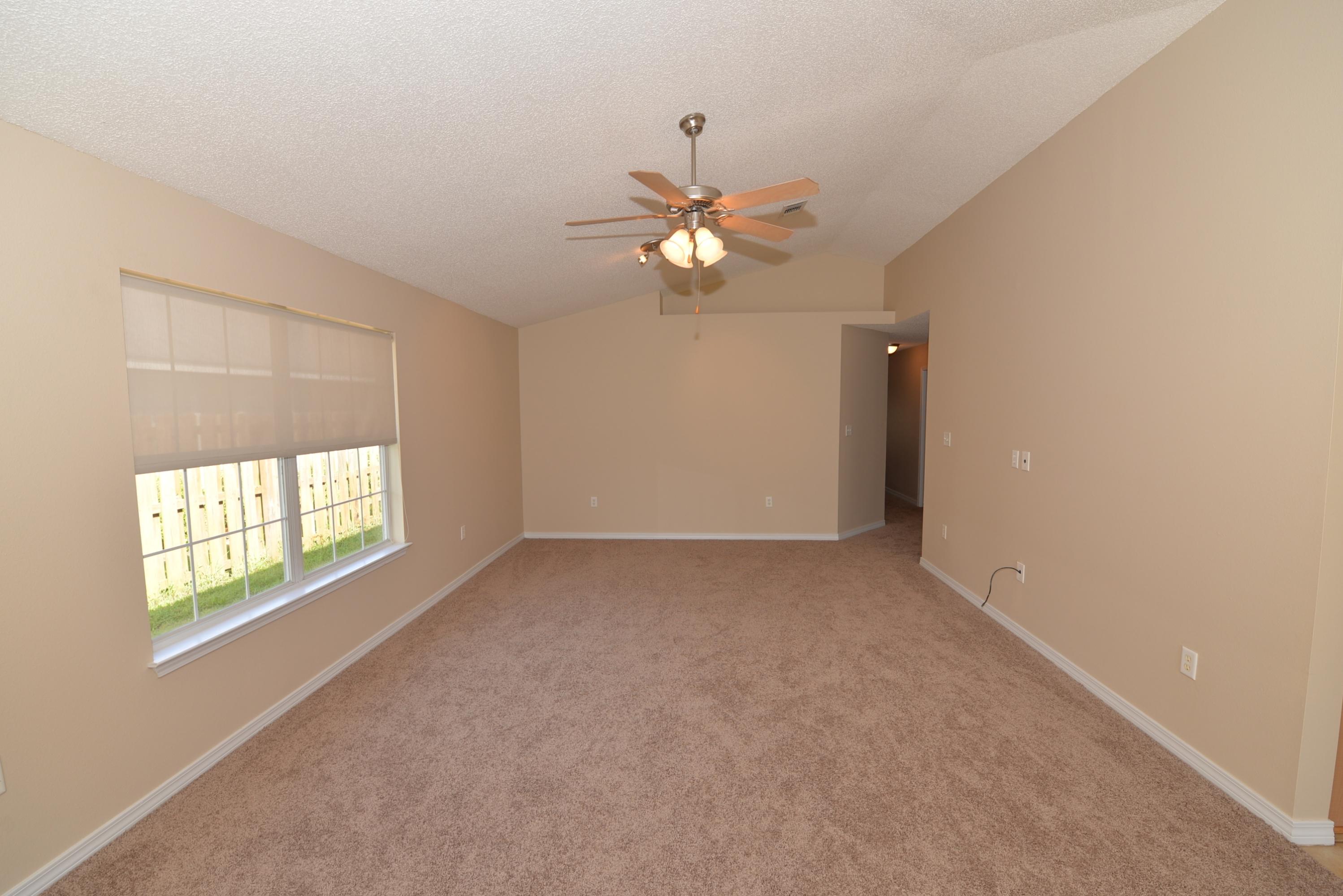 68 South Harborview Road Santa Rosa Beach, FL 32459 - Photo 3 of 26 a view of an empty room with a window