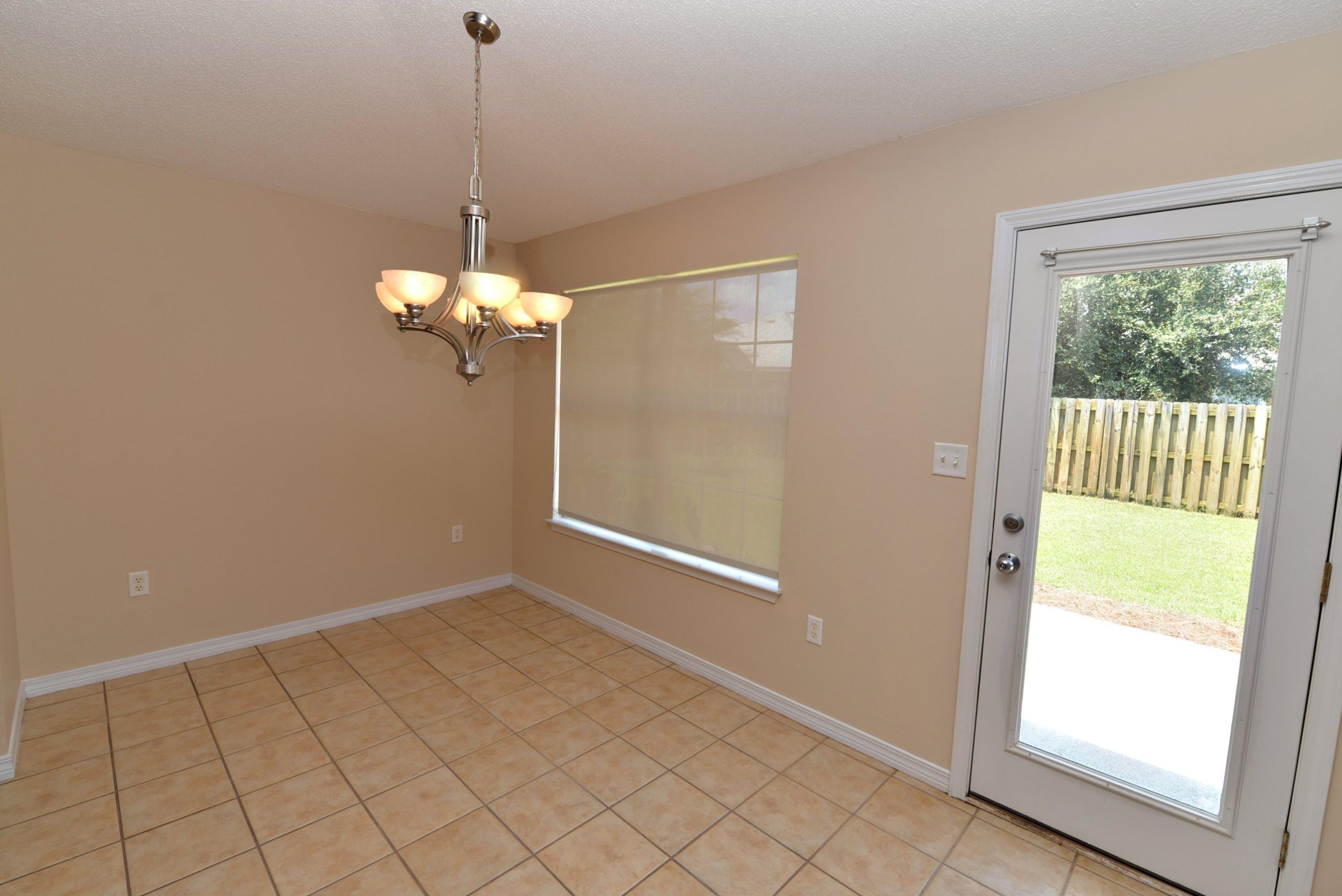 68 South Harborview Road Santa Rosa Beach, FL 32459 - Photo 8 of 26 a view of an empty room with a window