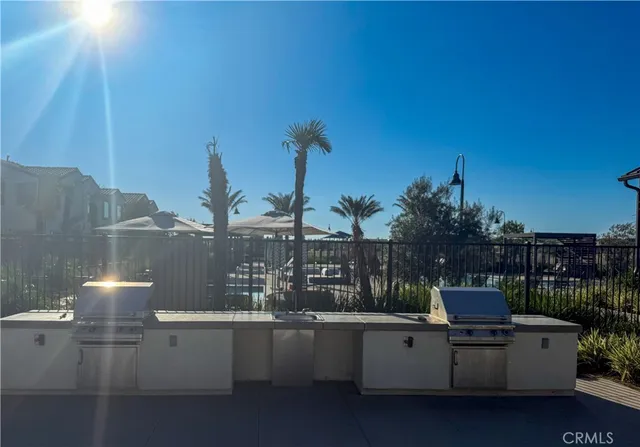 a view of a patio with couches table and chairs