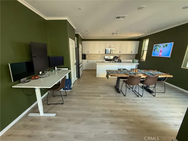 a view of a dining room with furniture