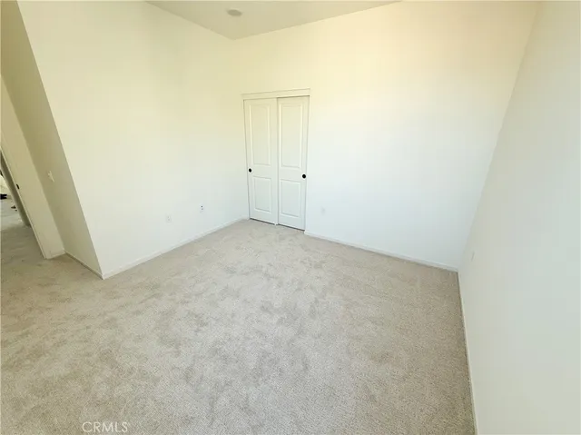 an empty room with an entryway