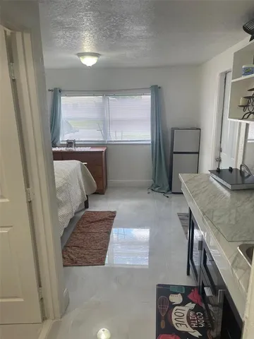 a view of kitchen and utility room