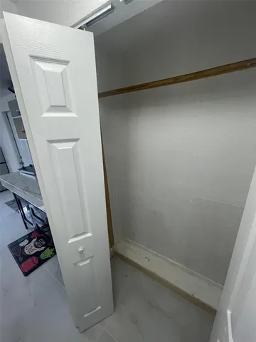 a bathroom with a sink a vanity and a mirror