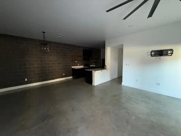 a kitchen view with wooden cabinets and stainless steel appliances