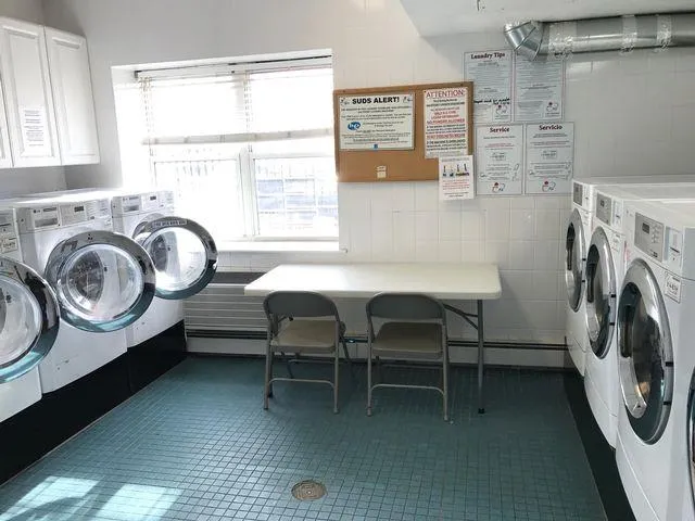 a view of a kitchen and a window