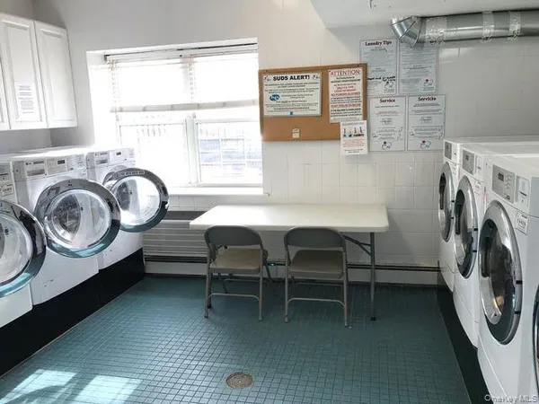 a view of a kitchen and a window