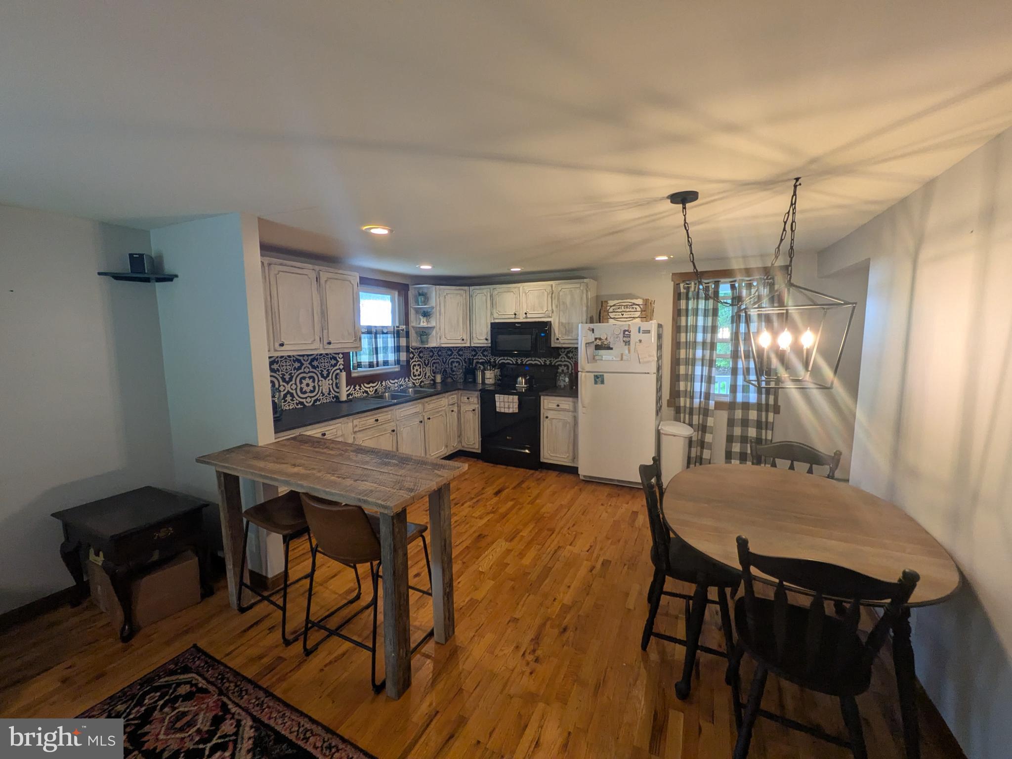 2418 Muddy Run Road Mifflintown, PA 17059 - Photo 19 of 44 a kitchen with a table and chairs in it