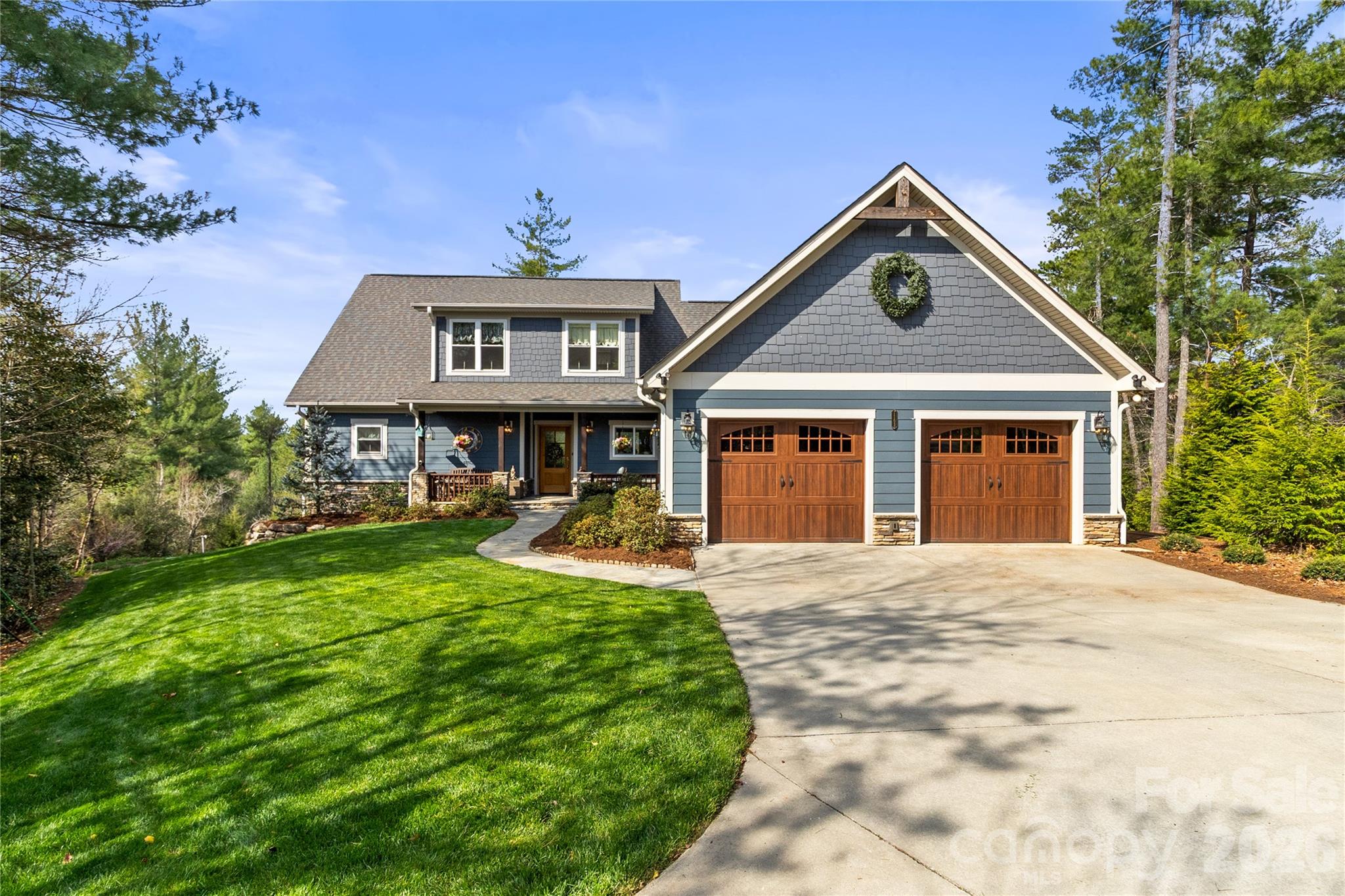 1103 River Ridge Way Lenoir, NC 28645 - Photo 1 of 46 a front view of a house with yard porch and livingroom