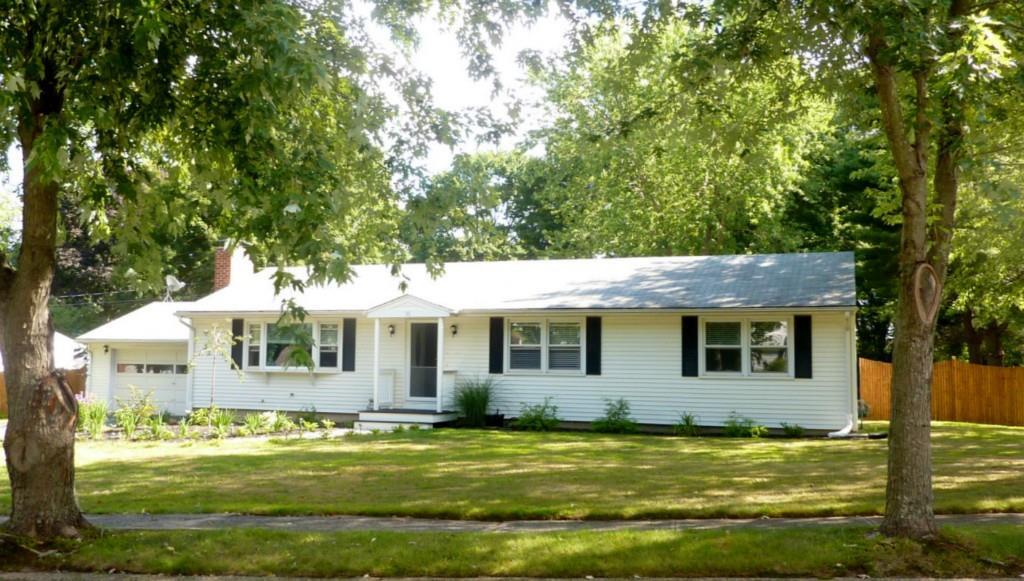 11 Brownstone Road Wallingford, CT 06492 - Photo 1 of 1 a front view of a house with a garden