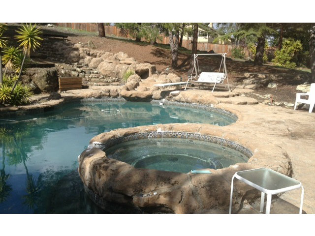 351 Ridgeway Road Woodside, CA 94062 - Photo 6 of 19 a view of a lake in middle of the town