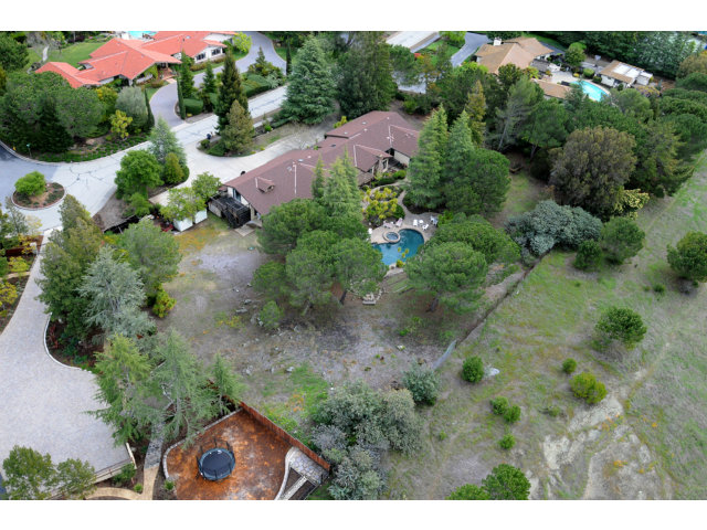 351 Ridgeway Road Woodside, CA 94062 - Photo 9 of 19 an aerial view of a house with a yard
