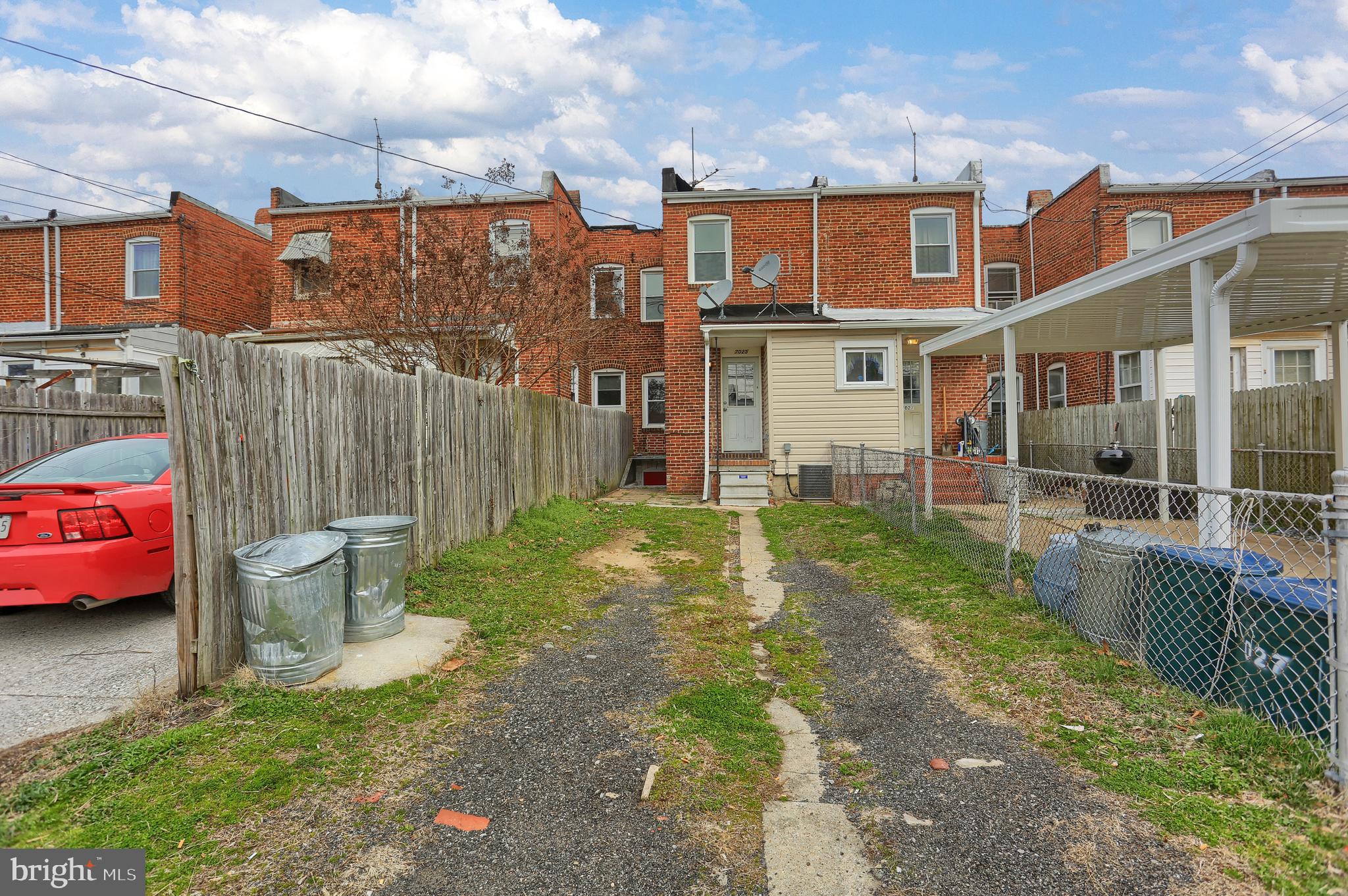 7025 Dunbar Road Dundalk, MD 21222 - Photo 26 of 27 a view of a patio with couches chairs and potted plants