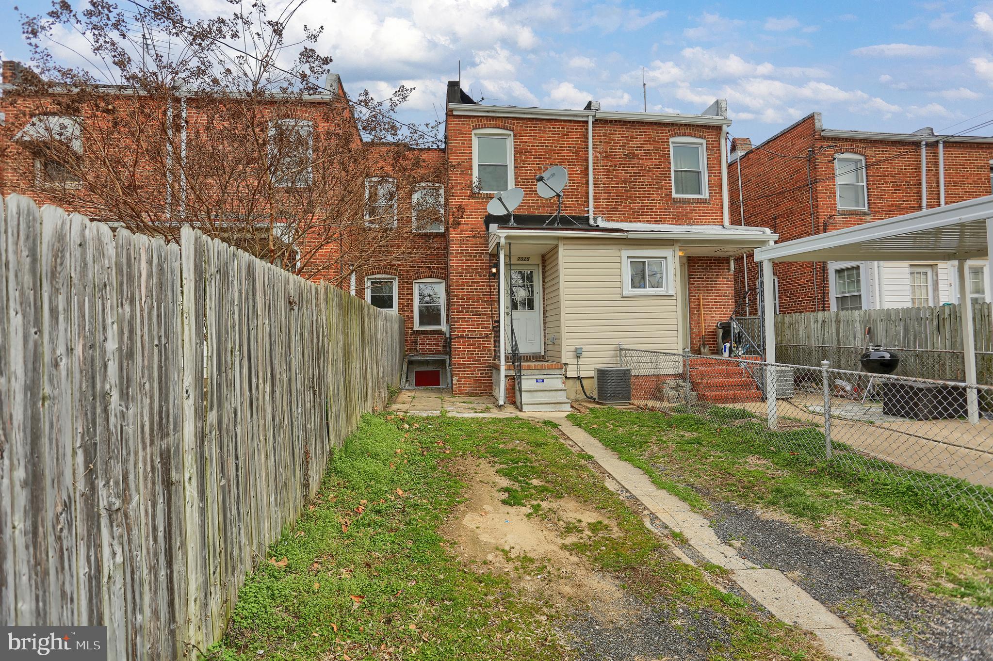 7025 Dunbar Road Dundalk, MD 21222 - Photo 27 of 27 a view of a house with backyard and garden