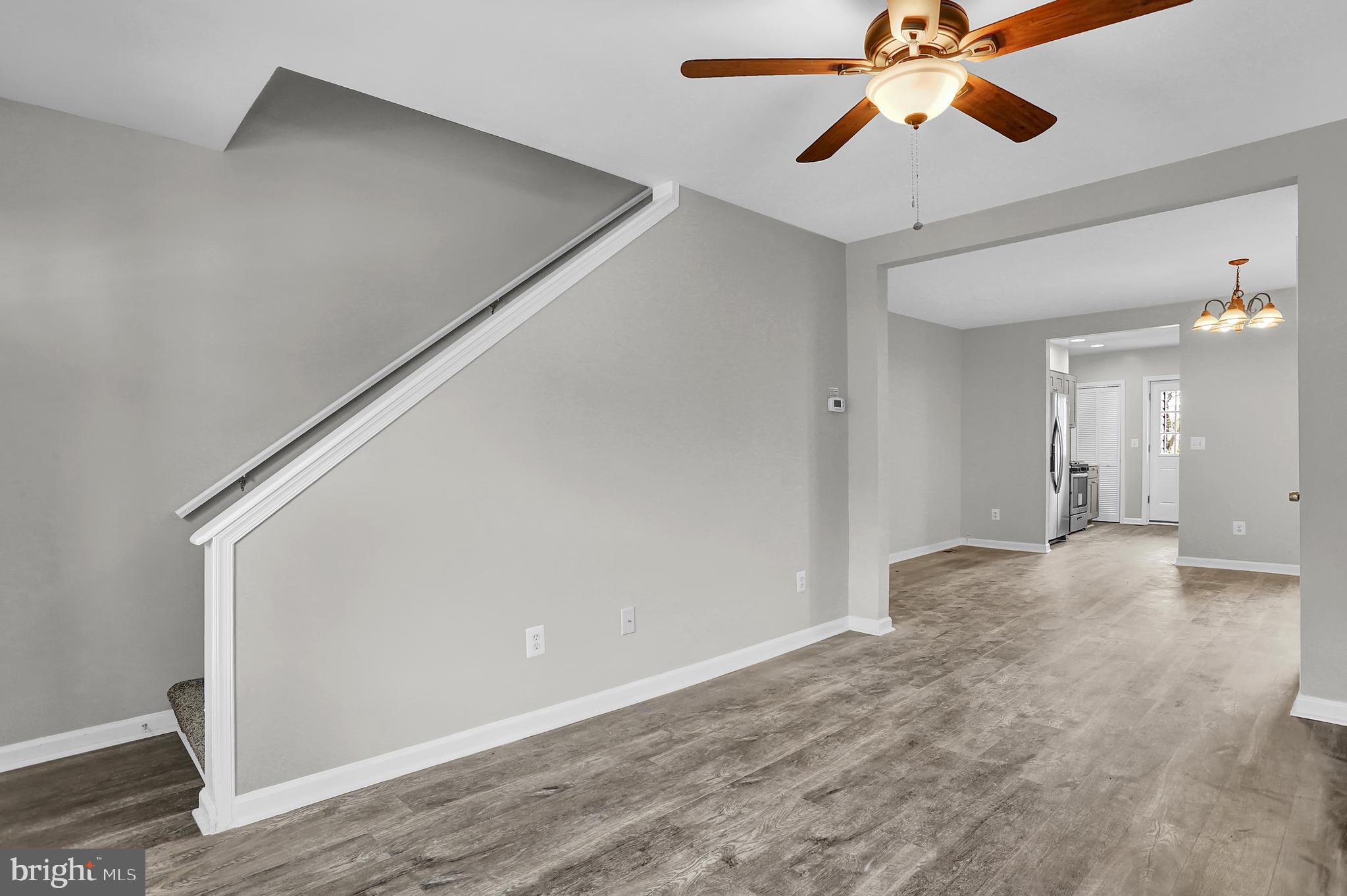 7025 Dunbar Road Dundalk, MD 21222 - Photo 5 of 27 a view of an empty room and window