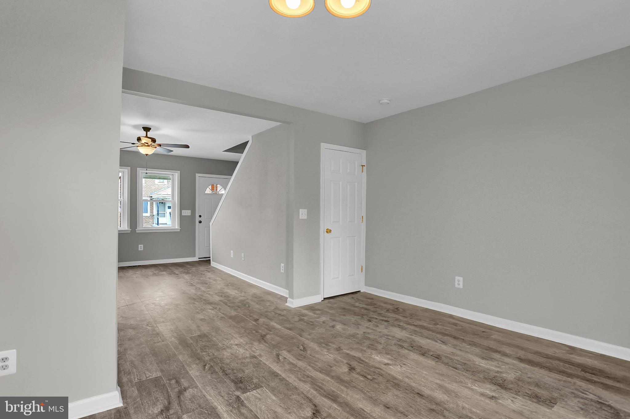 7025 Dunbar Road Dundalk, MD 21222 - Photo 10 of 27 wooden floor in an empty room