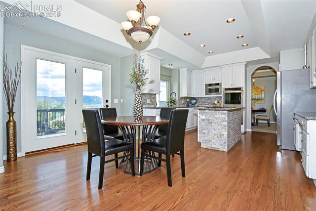 15190 Ridgefield Lane Colorado Springs, CO 80921 - Photo 13 of 31 Have your morning coffee while enjoying the incredible mountain majesties!