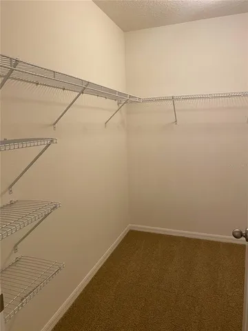 a view of small space with racks on the wall